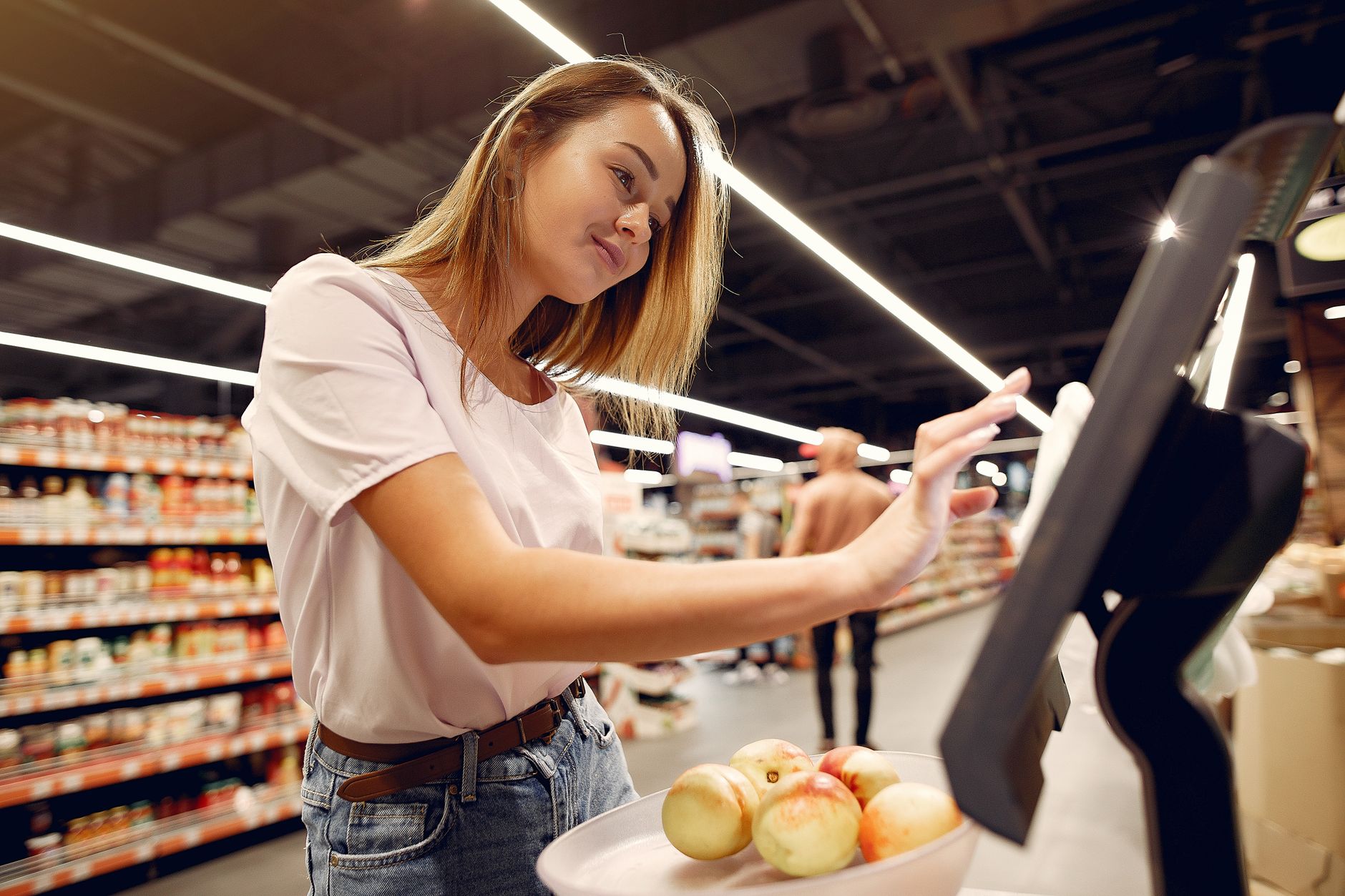 Customer loyalty program displayed on tablet at retail checkout counter
