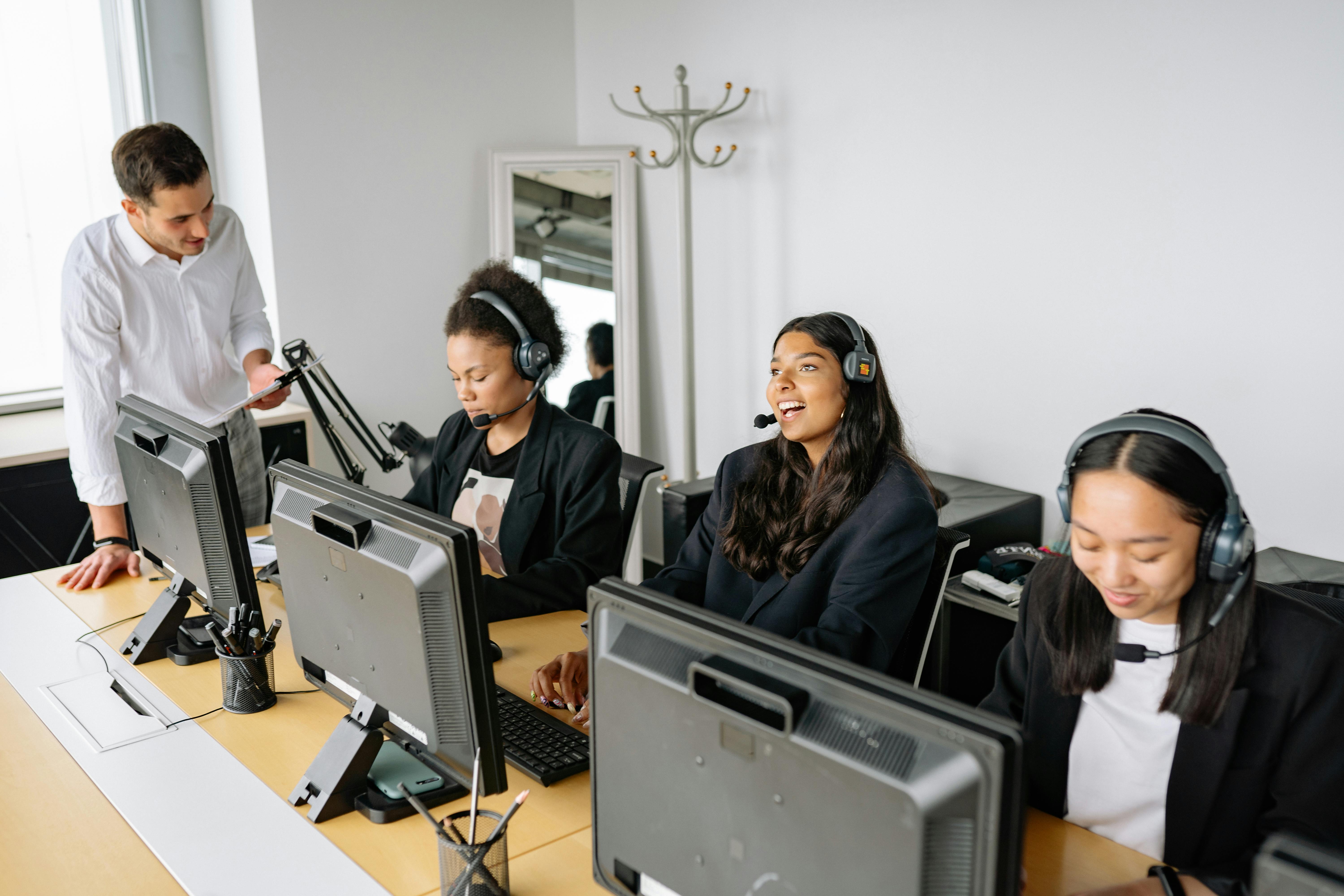 Sales team reviewing customer relationship management data on a dashboard screen